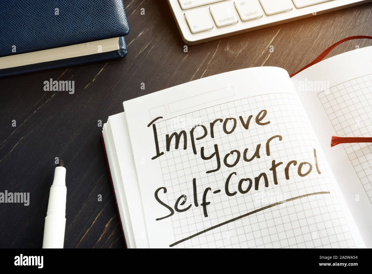 Improve Your Self-Control sign in the red notebook. Stock Photo