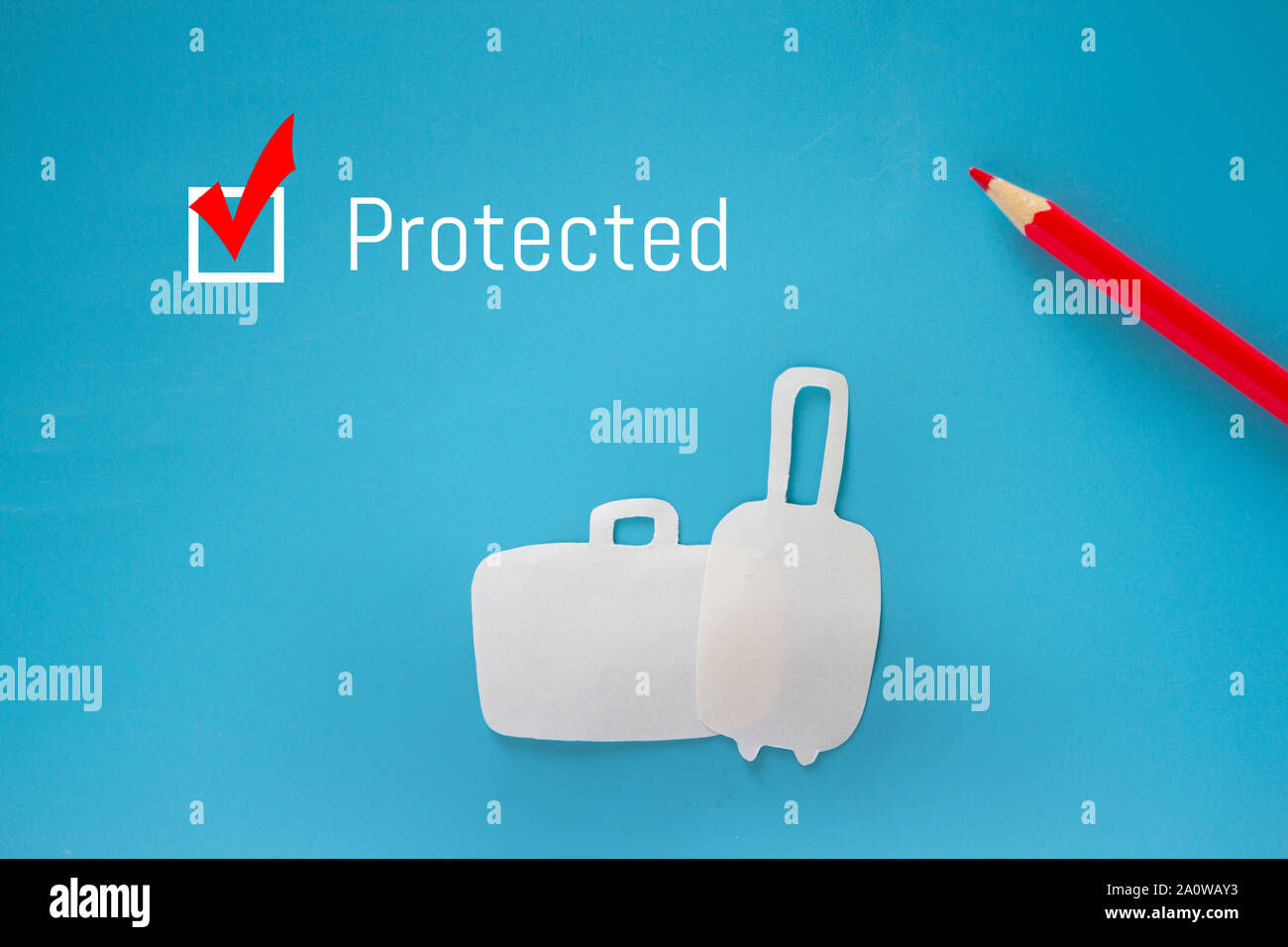 Concept booking travel insurance. Luggage on blue background Stock