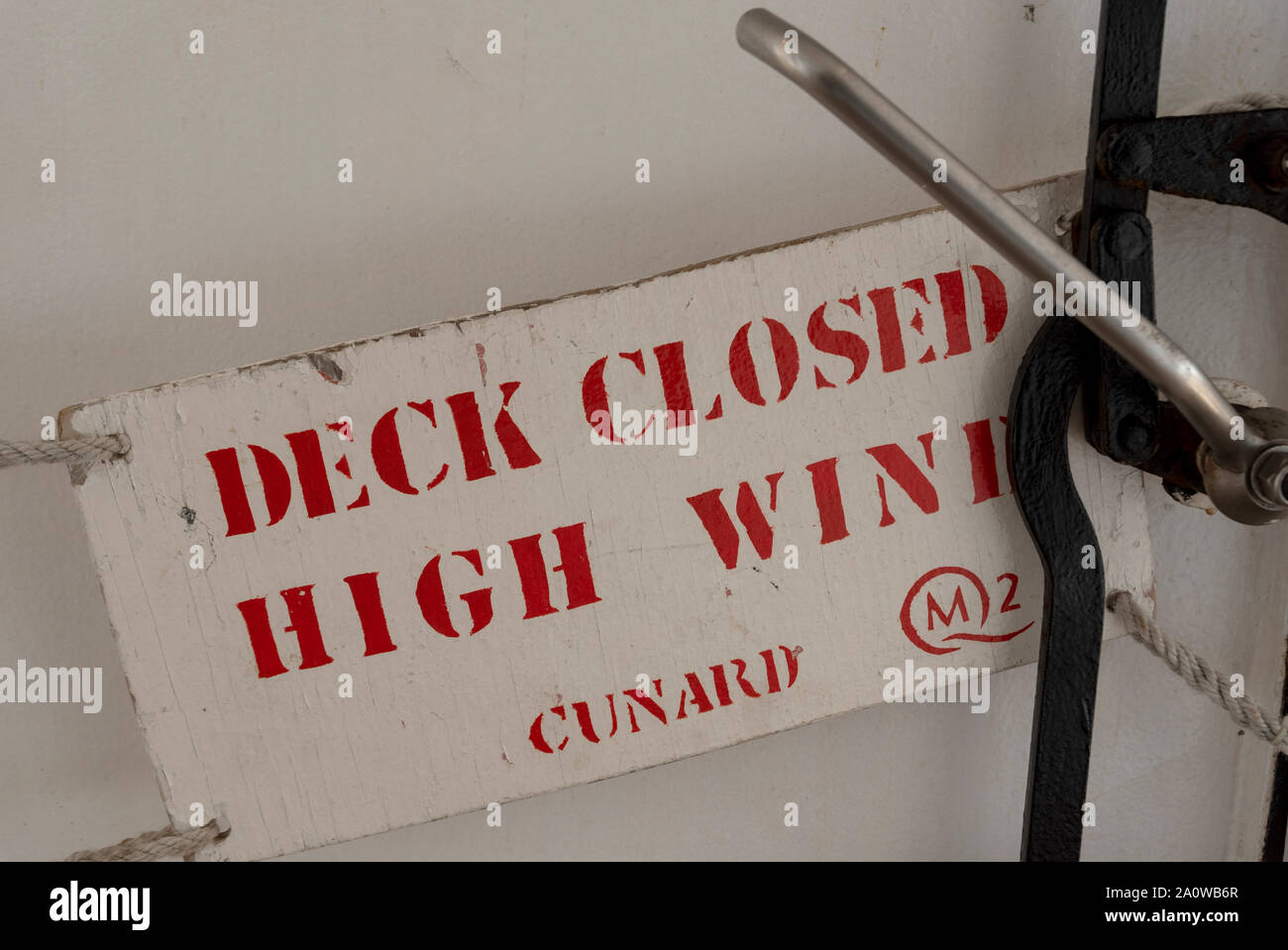 Deck closed to high winds - warning sign Stock Photo