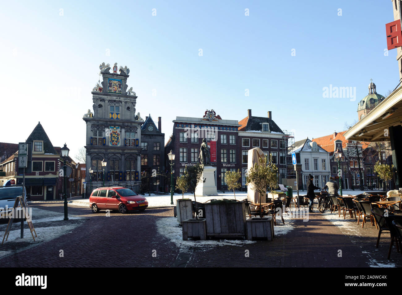 Hoorn, North Holland / Netherlands - March 11, 2012: Snow on streets of Hoorn city. Old town at sunny winter day. Stock Photo