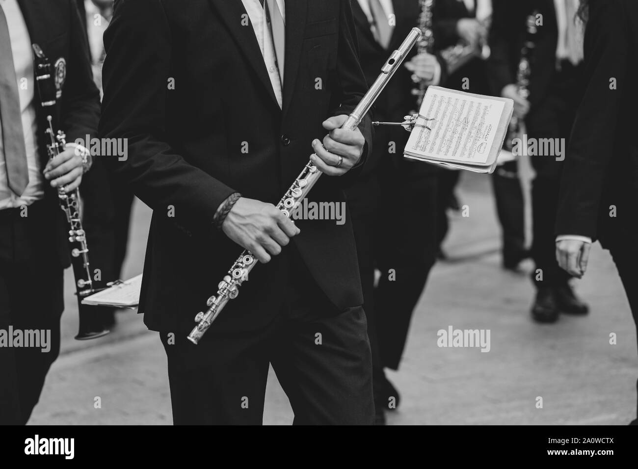 Man holding a transverse flute Stock Photo