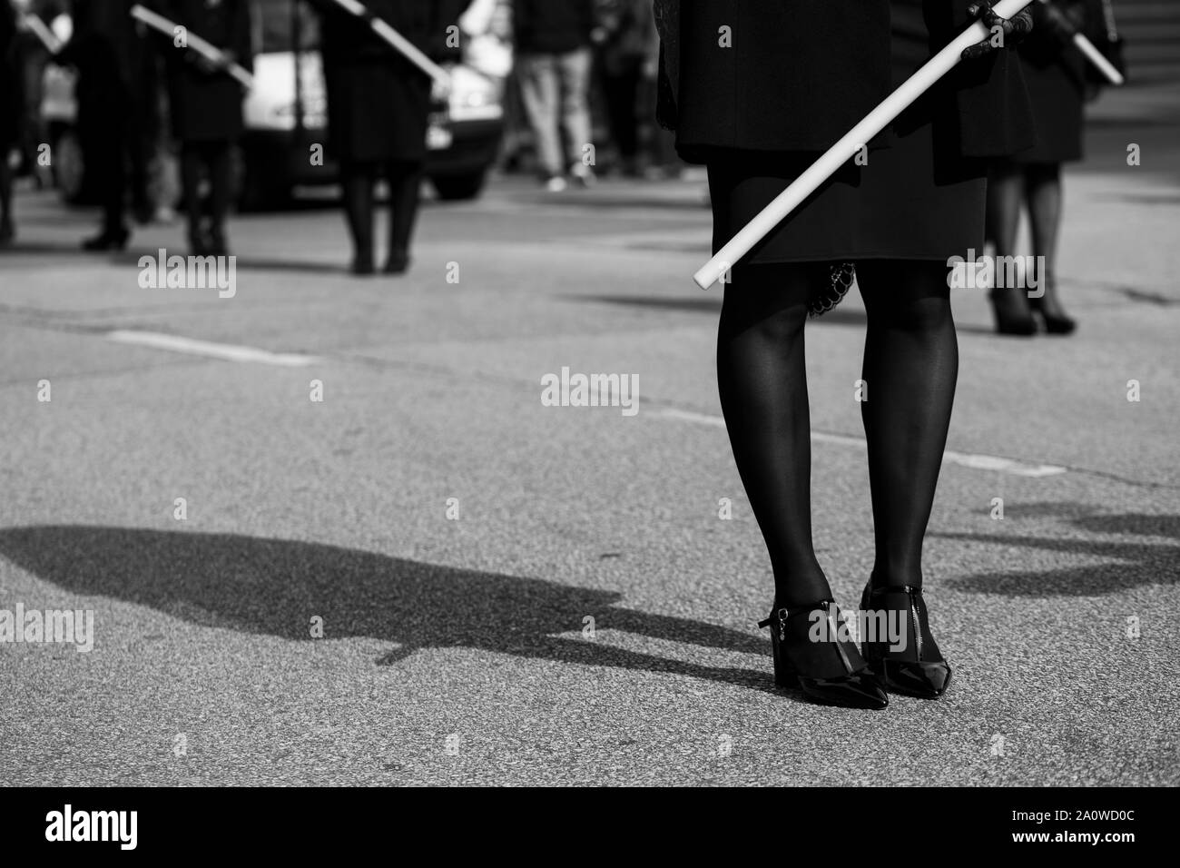 'Manola' is holding a candle in a procession, Holy Week Stock Photo