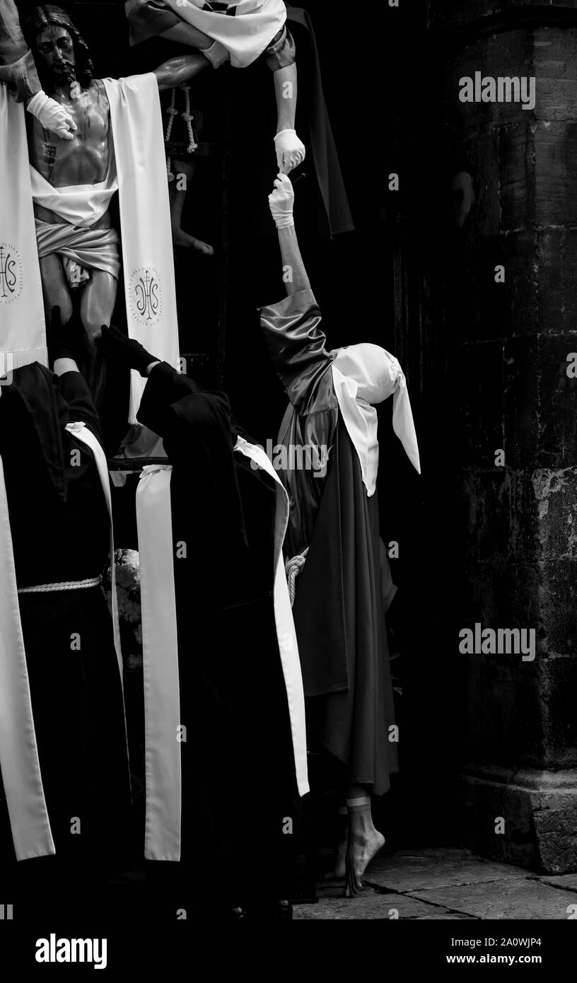Penitent standing on tiptoe, Holy Week Stock Photo Alamy