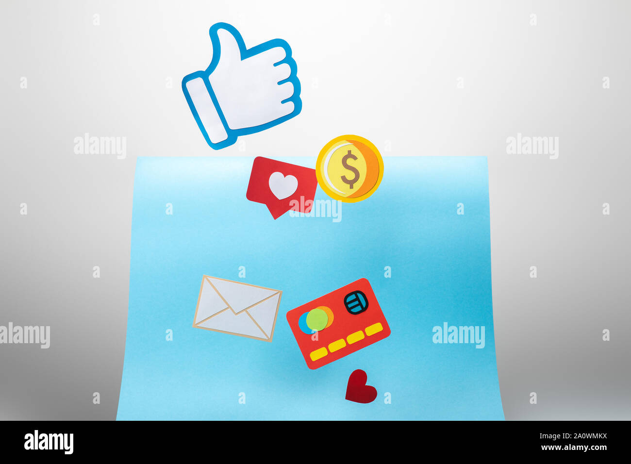 colorful paper icons and thumb up on white background Stock Photo