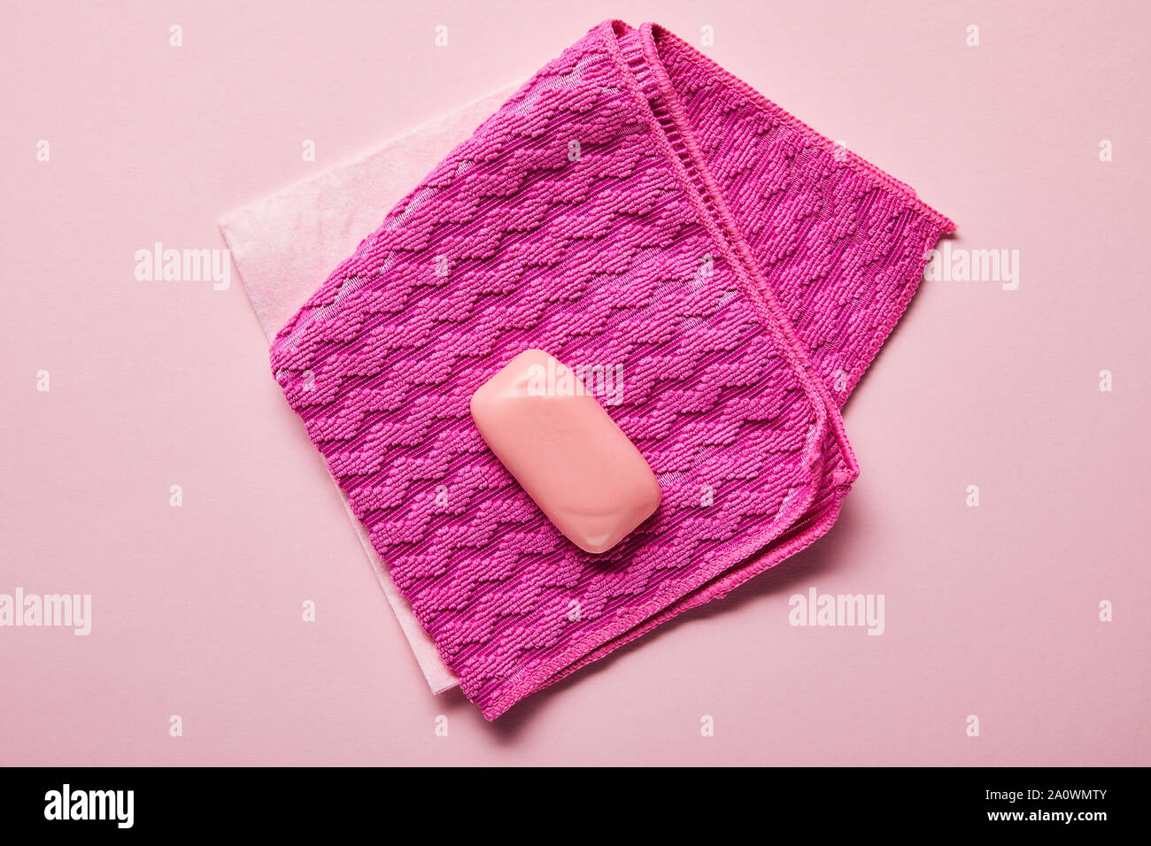 top view of pink rags and soap on pink background Stock Photo - Alamy