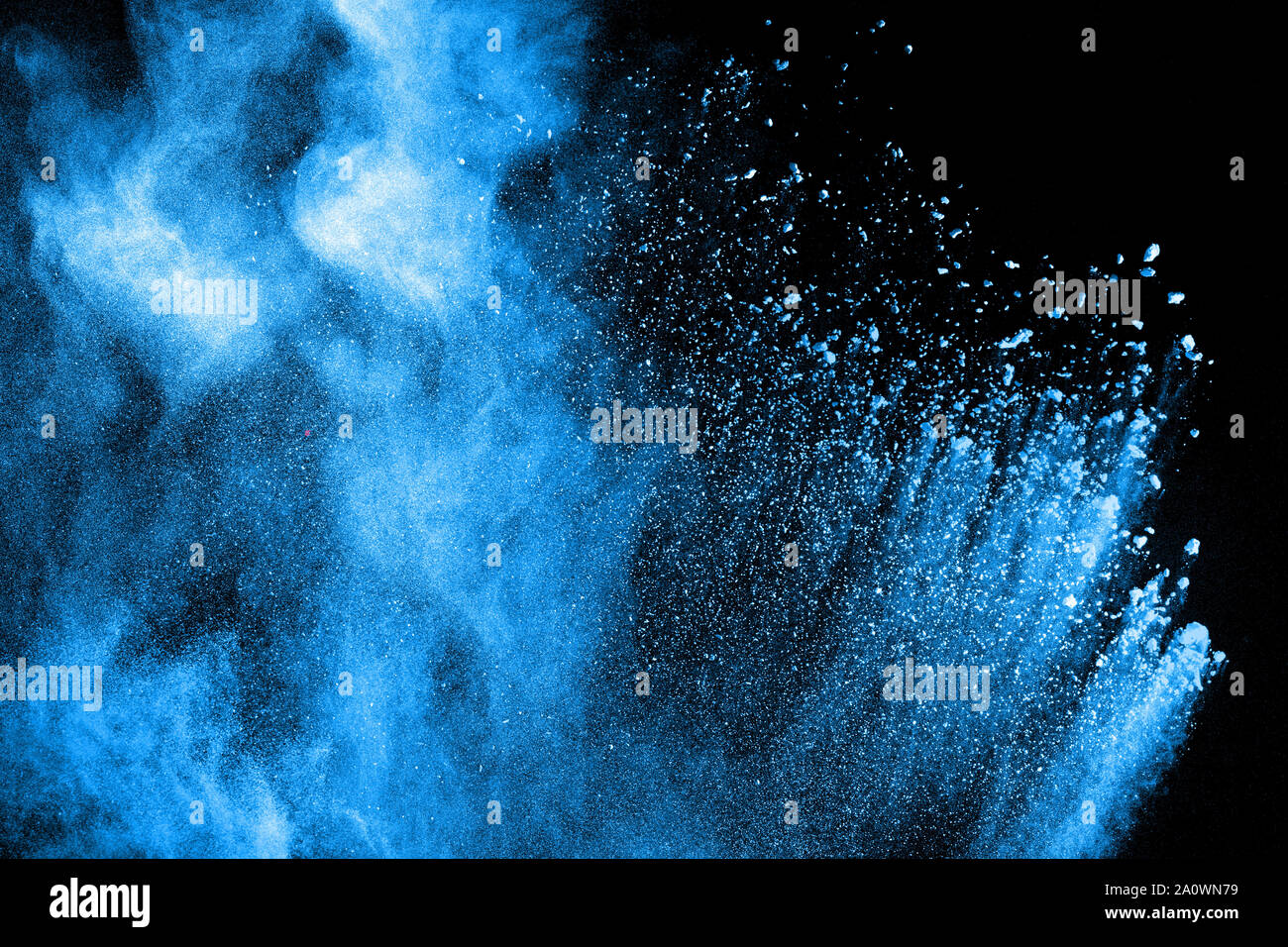 Blue powder explode cloud on black background. Launched blue dust particles  splash on background Stock Photo - Alamy