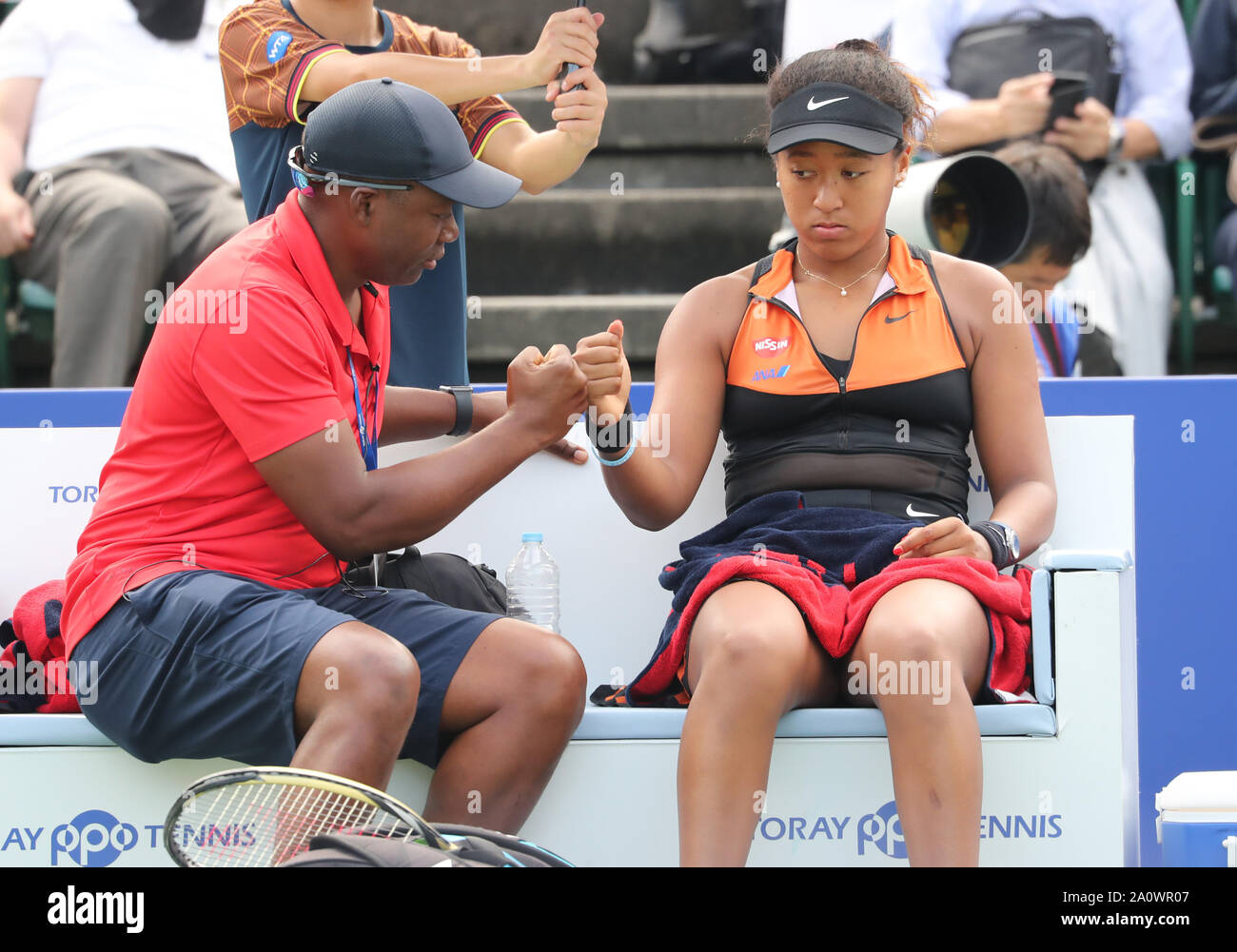 Osaka, Japan. 21st Sep, 2019. Japanese tennis player Naomi Osaka listens to  her Haitian-American father and coach Leonard Francois (L) during the  quarter finals of the Toray Pan Pacific Open tennis tournament