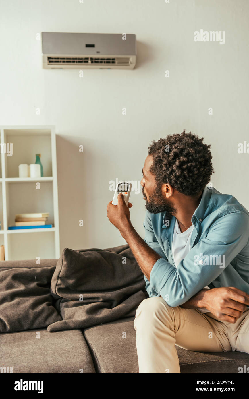 Man Using Ac Man With Air Conditioner High Resolution Stock Photography and Images ...