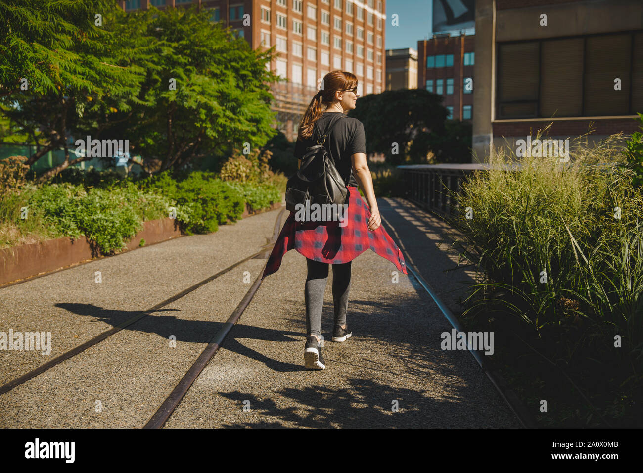 Beautiful woman walking hi-res stock photography and images - Alamy