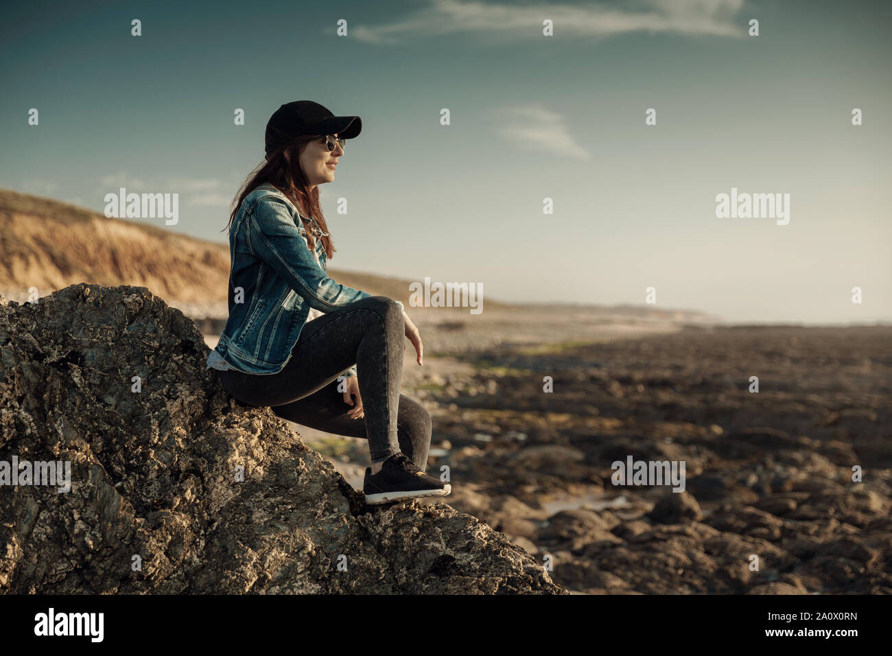 Seated on the beach hi-res stock photography and images - Alamy