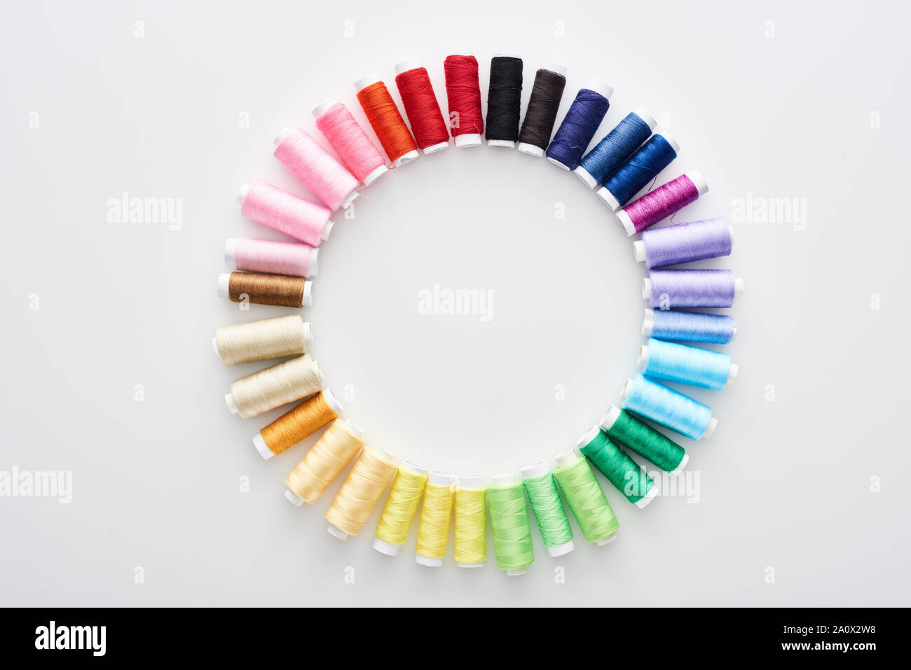 Top View Thread top view of bright and colorful threads on white background Stock Photo ...