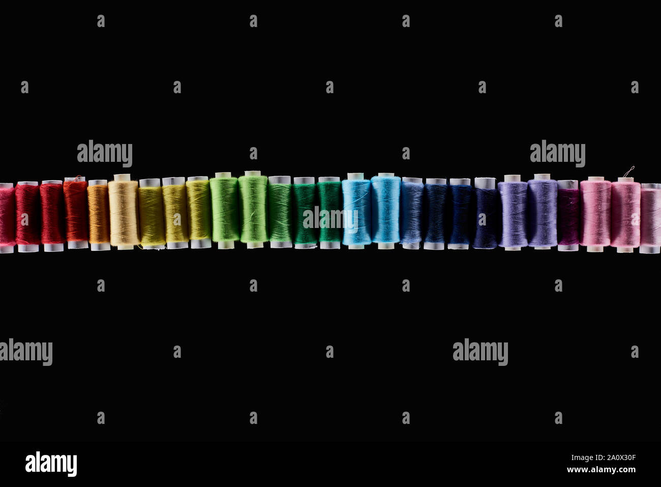 Top View Thread top view of bright and colorful threads isolated on black Stock Photo ...