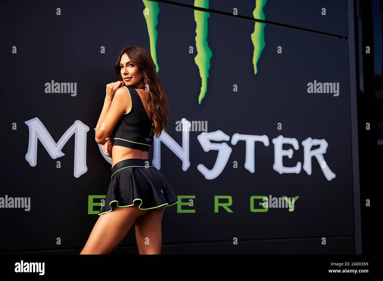 22nd September 2019; Ciudad del Motor de Aragon, Alcaniz, Spain; Aragon Motorcycle Grand Prix, Race Day; a Monster Energy paddock girl poses during the Warm Up Stock Photo