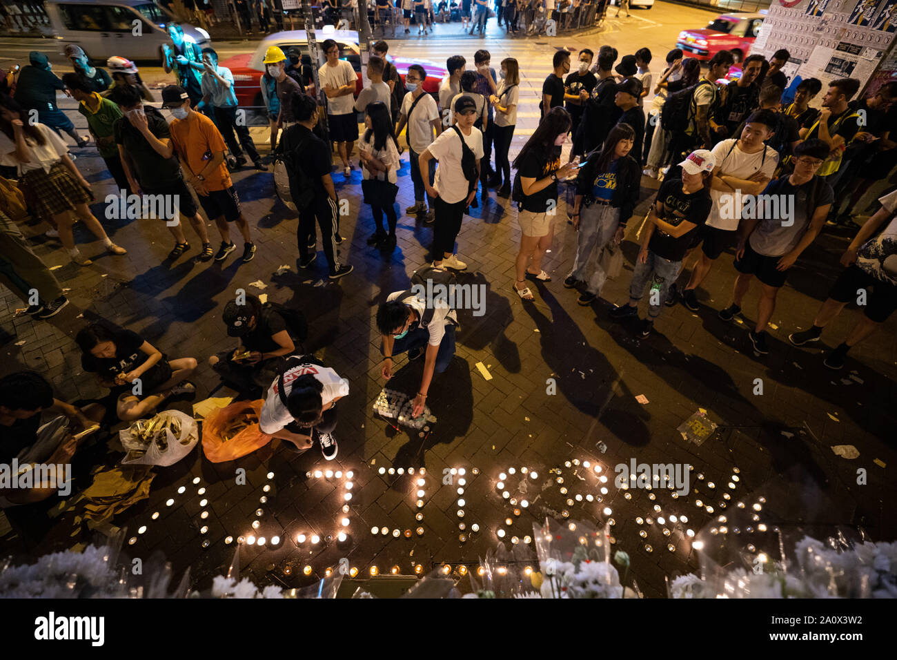 People light up candles to pay tribute for those who lost their lives in Prince Edward MTR station on 31 of August.Pro-democracy protesters have continued demonstrations across Hong Kong, calling for the city's Chief Executive Carrie Lam to immediately meet the rest of their demands, including an independent inquiry into police brutality, the retraction of the word “riot” to describe the rallies, and genuine universal suffrage, as the territory faces a leadership crisis. Stock Photo