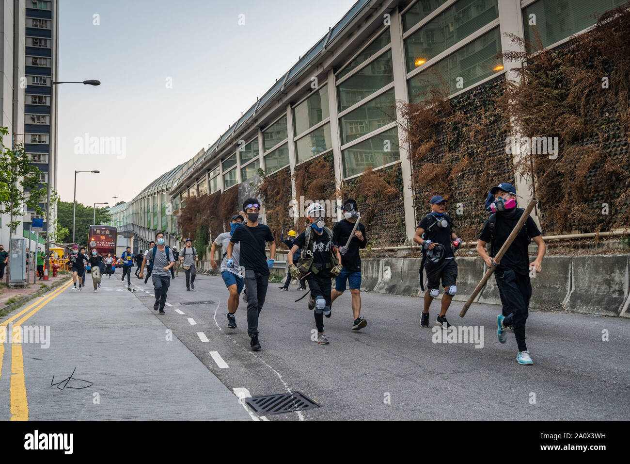 Protesters running away from their original position as riot police attempted to make arrest during the protest.Pro-democracy protesters have continued demonstrations across Hong Kong, calling for the city's Chief Executive Carrie Lam to immediately meet the rest of their demands, including an independent inquiry into police brutality, the retraction of the word “riot” to describe the rallies, and genuine universal suffrage, as the territory faces a leadership crisis. Stock Photo