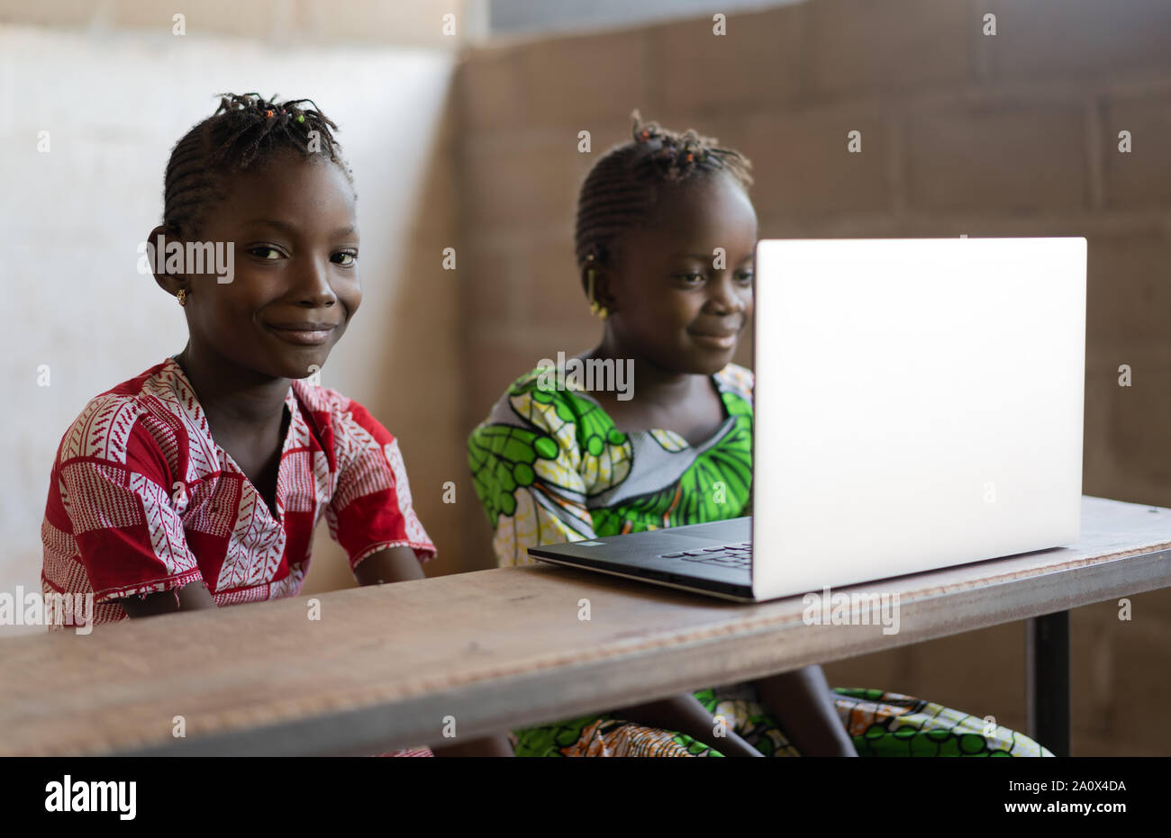 Smiling African Children working with Laptop Computer Stock Photo