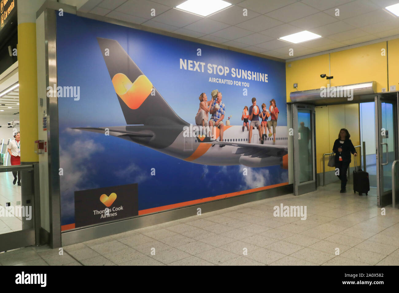 London, United Kingdom - 22 September 2019 . *Permission Granted*. A large poster advertising of Thomas Cook airlines at Gatwick Airport as the tour operator faces  financial difficulties with 150,000 passengers and holidaymakers stranded abroad. Thomas Cook needs to raise another £200million to avoid going into administration  Credit: amer ghazzal/Alamy Live News Stock Photo