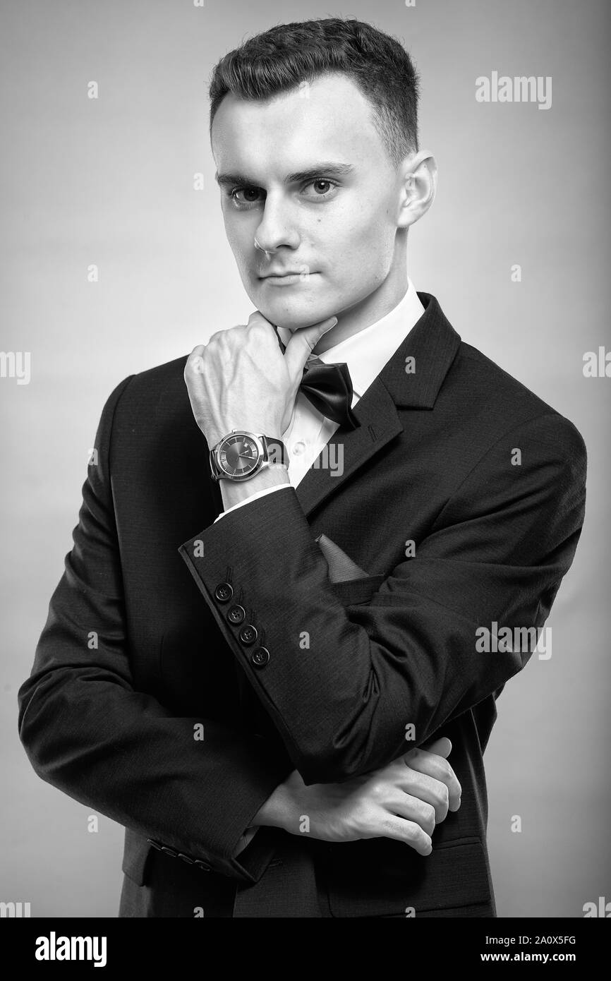 Monochrome closeup of a young man in a business suit Stock Photo - Alamy