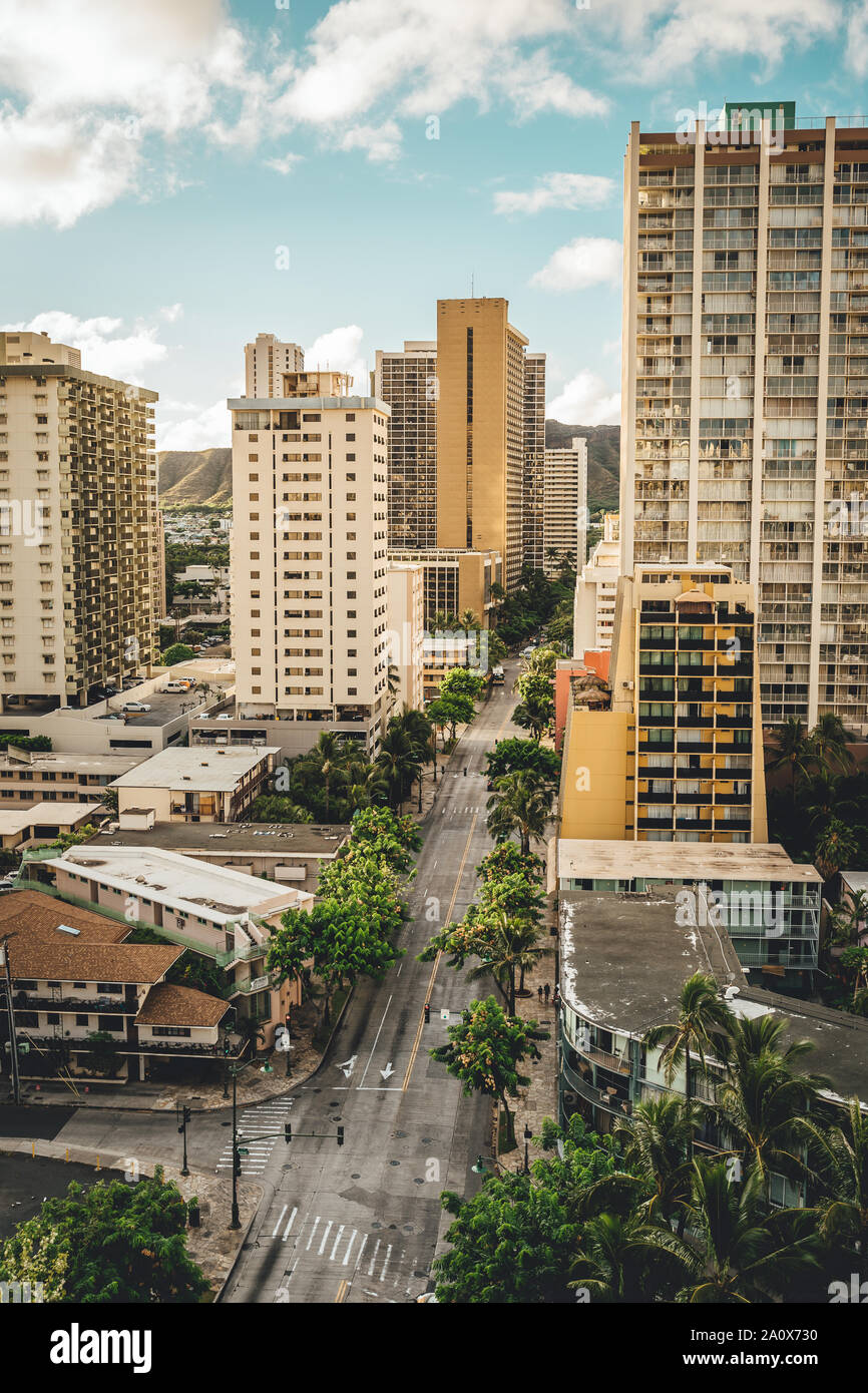 Beautiful Waikiki city views looking down Kuhio Ave on a clear, sunny day. Waikiki, Oahu, Hawaii. Stock Photo
