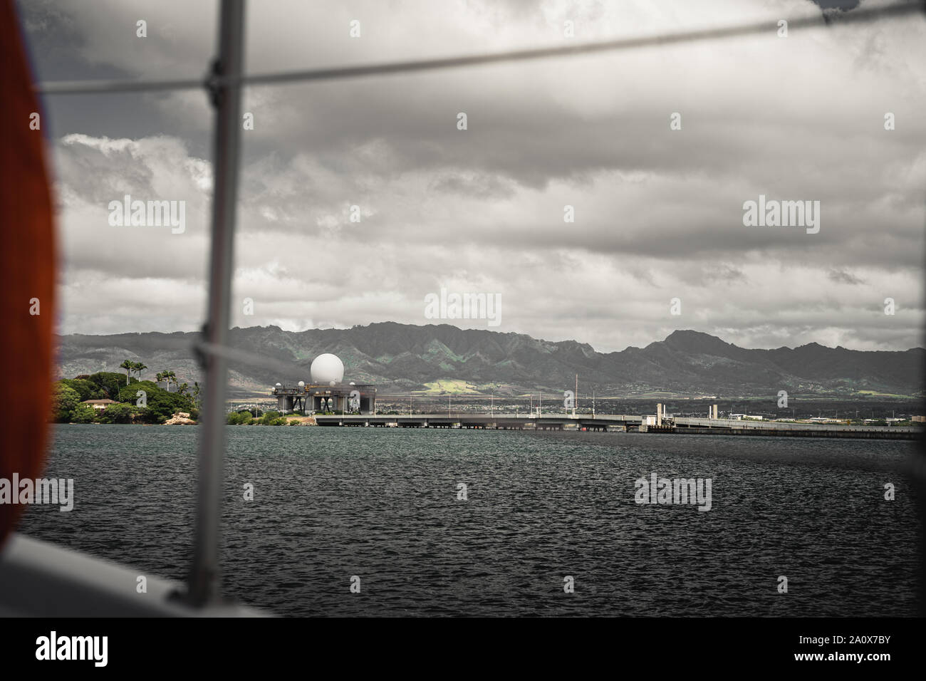Pearl Harbor, Hawaii - August 23rd 2019: Mountain views in the background of Fort Island Bridge. Taken from Pearl Harbor National Memorial. Stock Photo