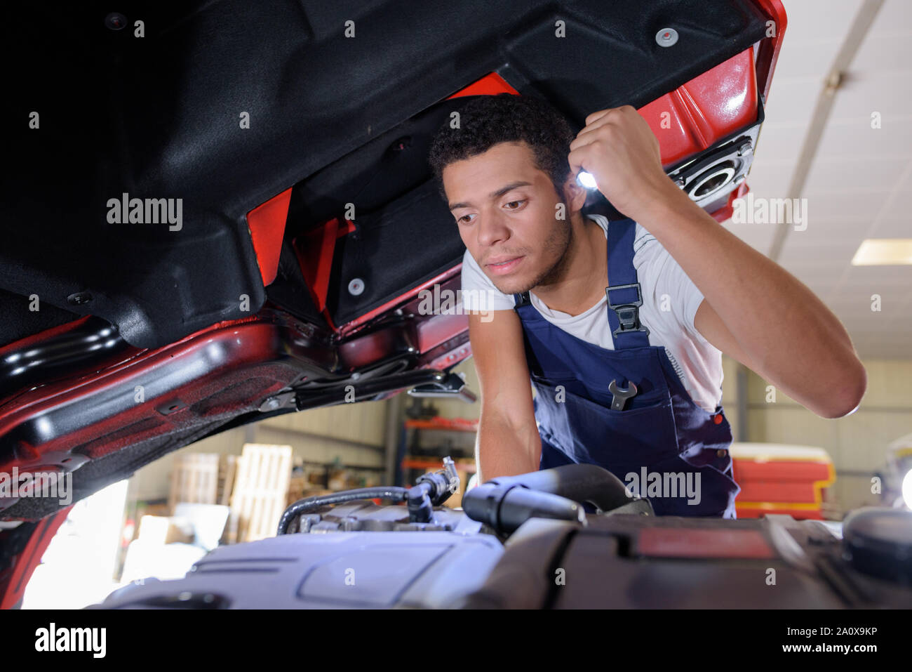 mechanic working on a car Stock Photo - Alamy
