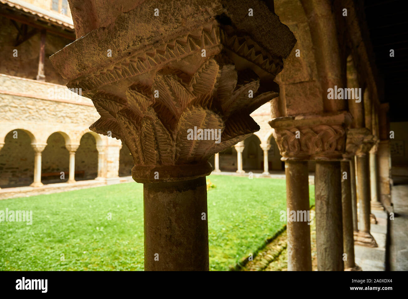 Decorated chapiter in the romanesque cloister of Saint-Lizier Cathedral historical monument (Saint-Lizier, Ariège, Occitanie, Pyrenees, France) Stock Photo