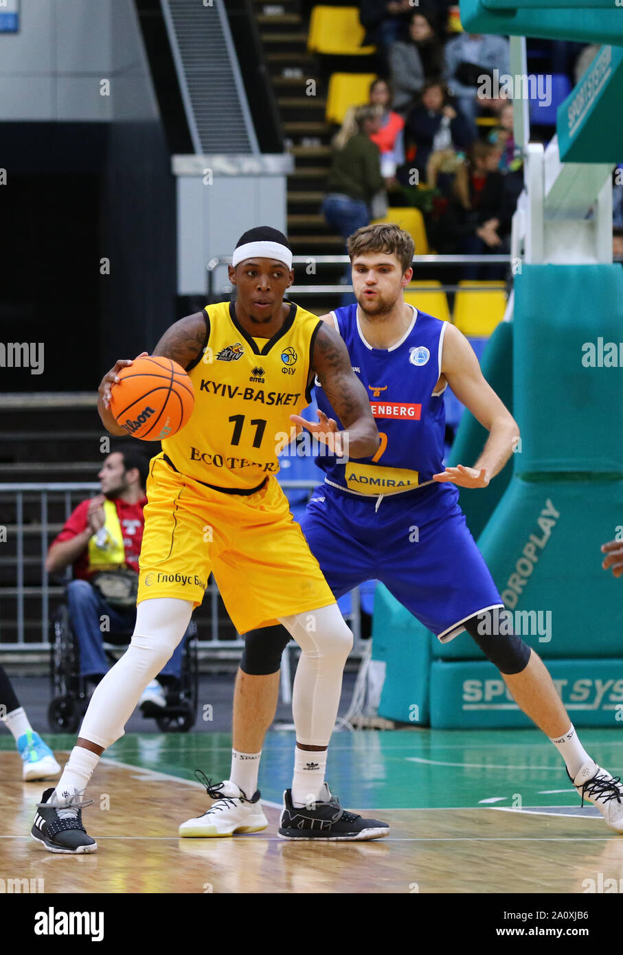 KYIV, UKRAINE - SEPTEMBER 20, 2019: Kyndahl Hill of BC Kyiv Basket (L) and  Ian Tristan Moschik of Kapfenberg Bulls in action during their FIBA  Basketball Champions League Qualifiers game in Kyiv