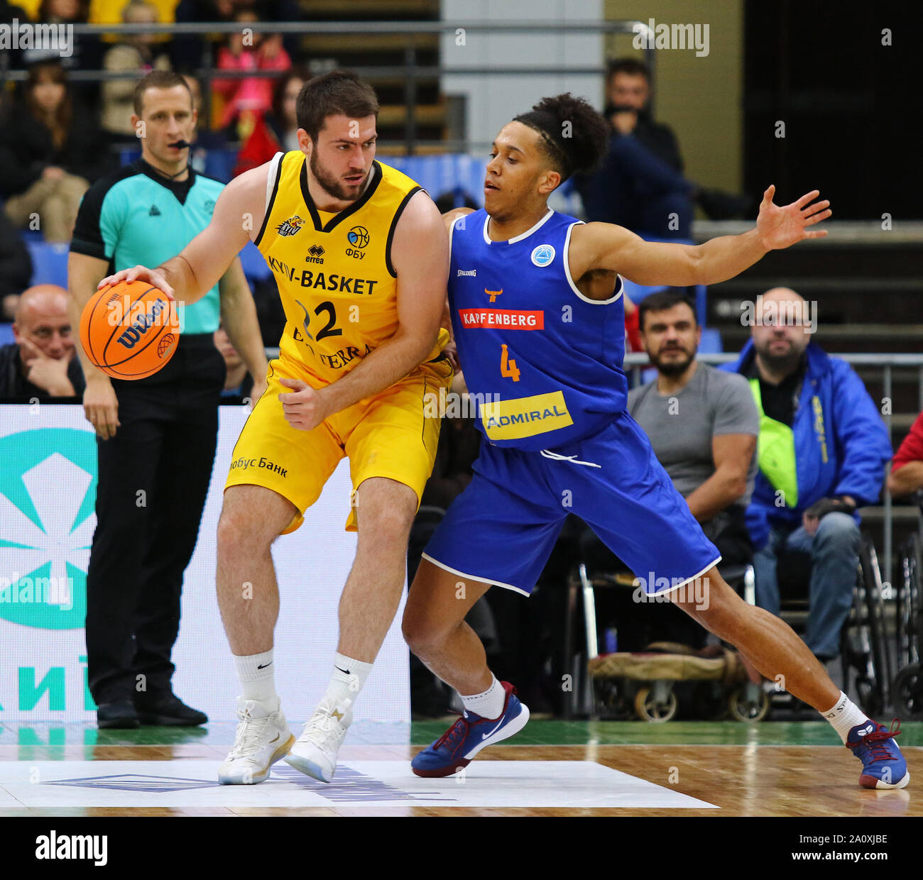 KYIV, UKRAINE - SEPTEMBER 20, 2019: Viacheslav Petrov of BC Kyiv Basket (L) and Keenan Nathanial Gumbs of Kapfenberg Bulls in action during their FIBA Basketball Champions League Qualifiers game Stock Photo
