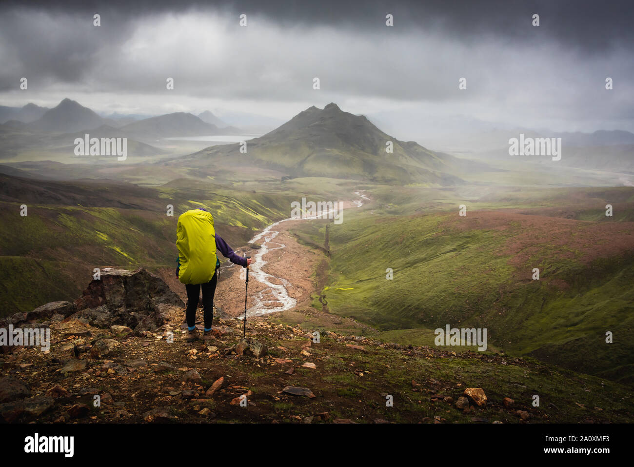 Hiker admiring stormy view on laugavegur trail, Iceland Stock Photo