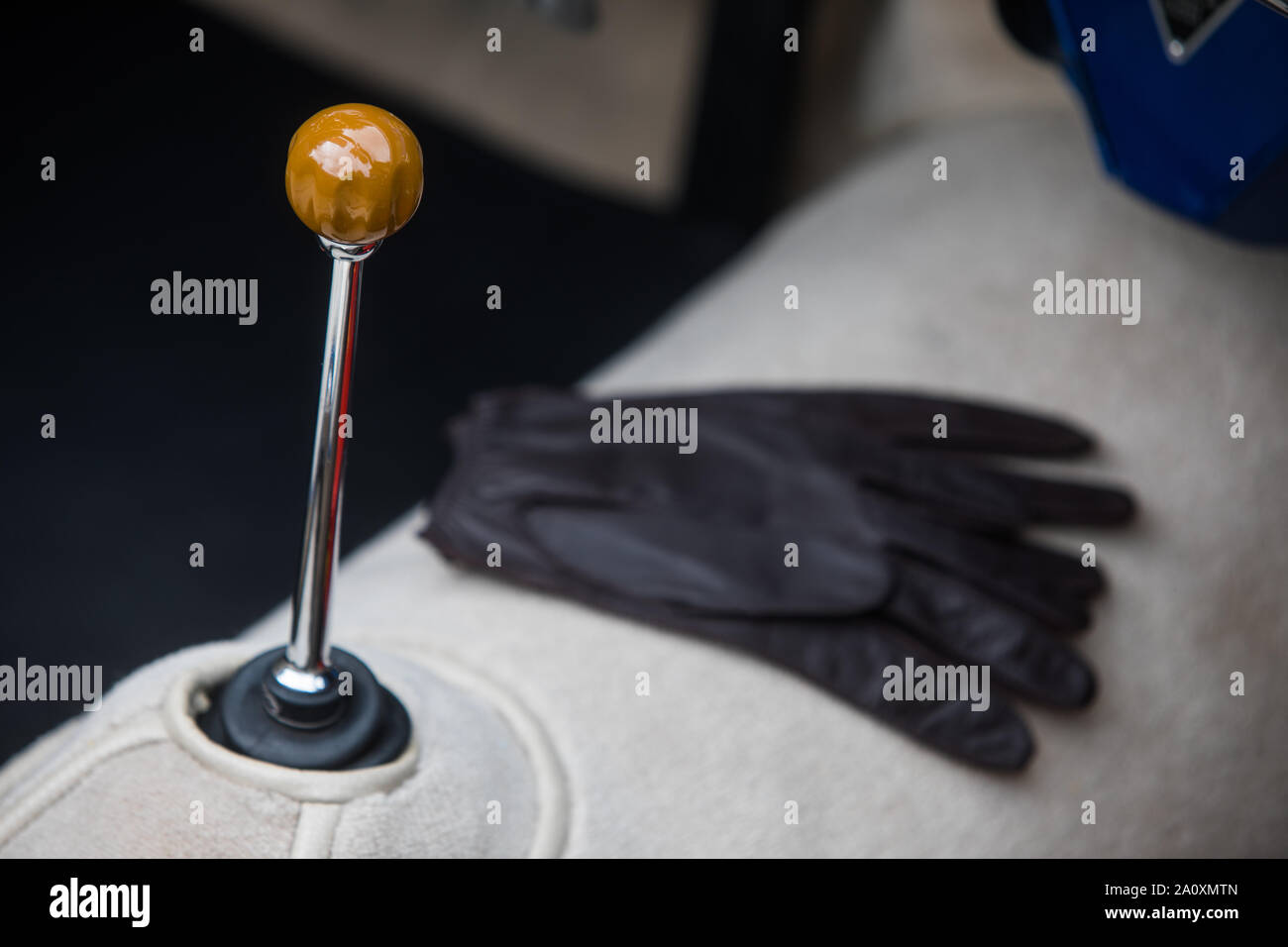 Close up horizontal shot of the gear shifter of a vintage car Stock