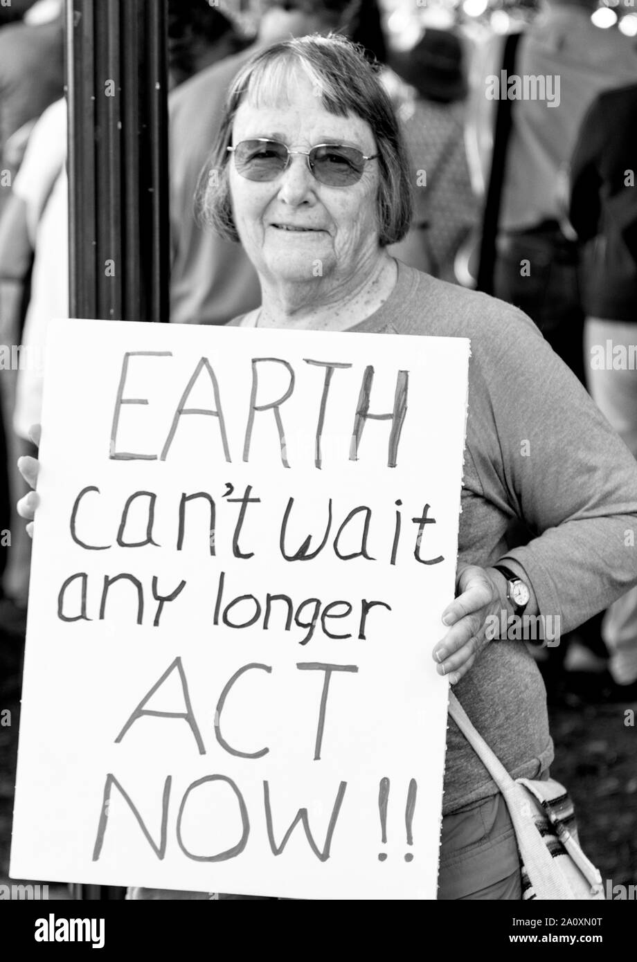 A senior citizen protests at the International Climate Justice Rally in Asheville, NC, USA. Stock Photo