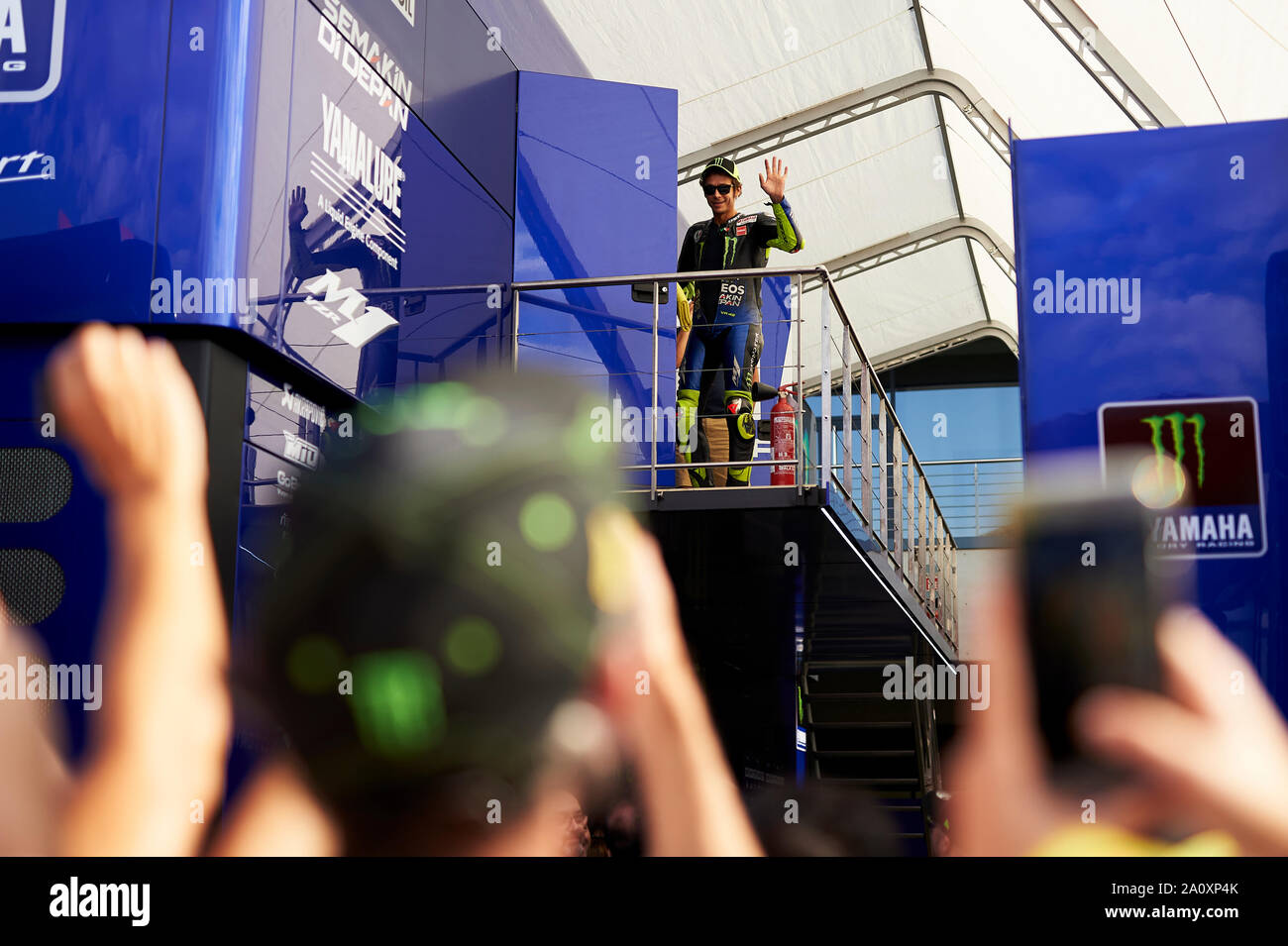 22nd September 2019; Ciudad del Motor de Aragon, Alcaniz, Spain; Aragon Motorcycle Grand Prix, Race Day; Valentino Rossi of the Monster Energy Yamaha Team greets his fans after the MotoGP warm up Stock Photo