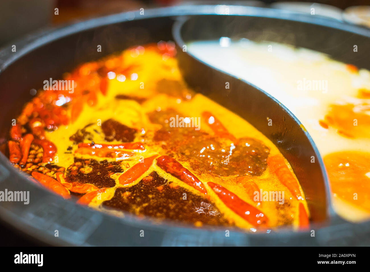 Chinese hot pot, with boiling mala spicy soup Stock Photo