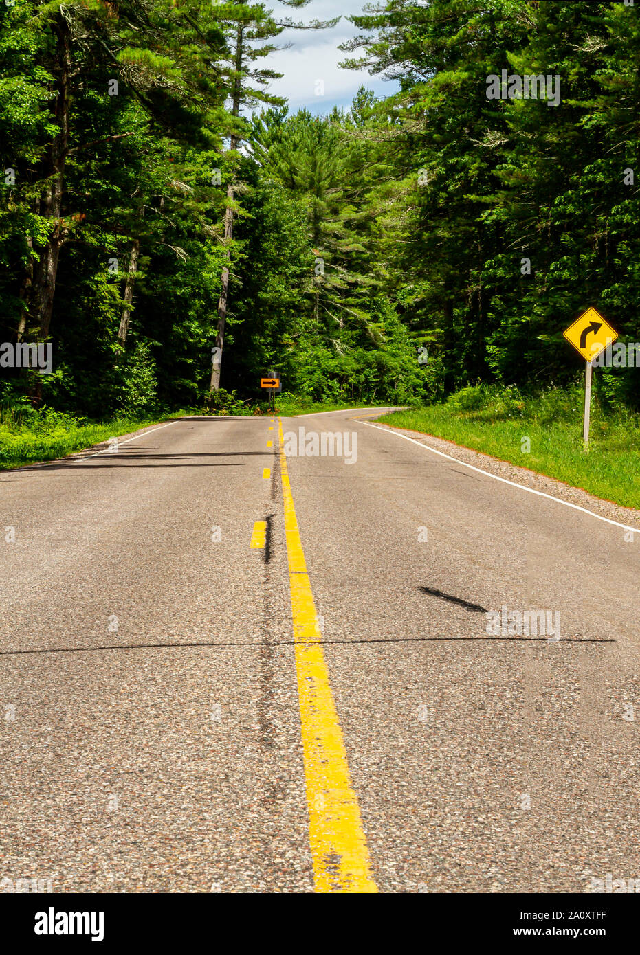 Looking down the centerline of an empty country road Stock Photo Alamy