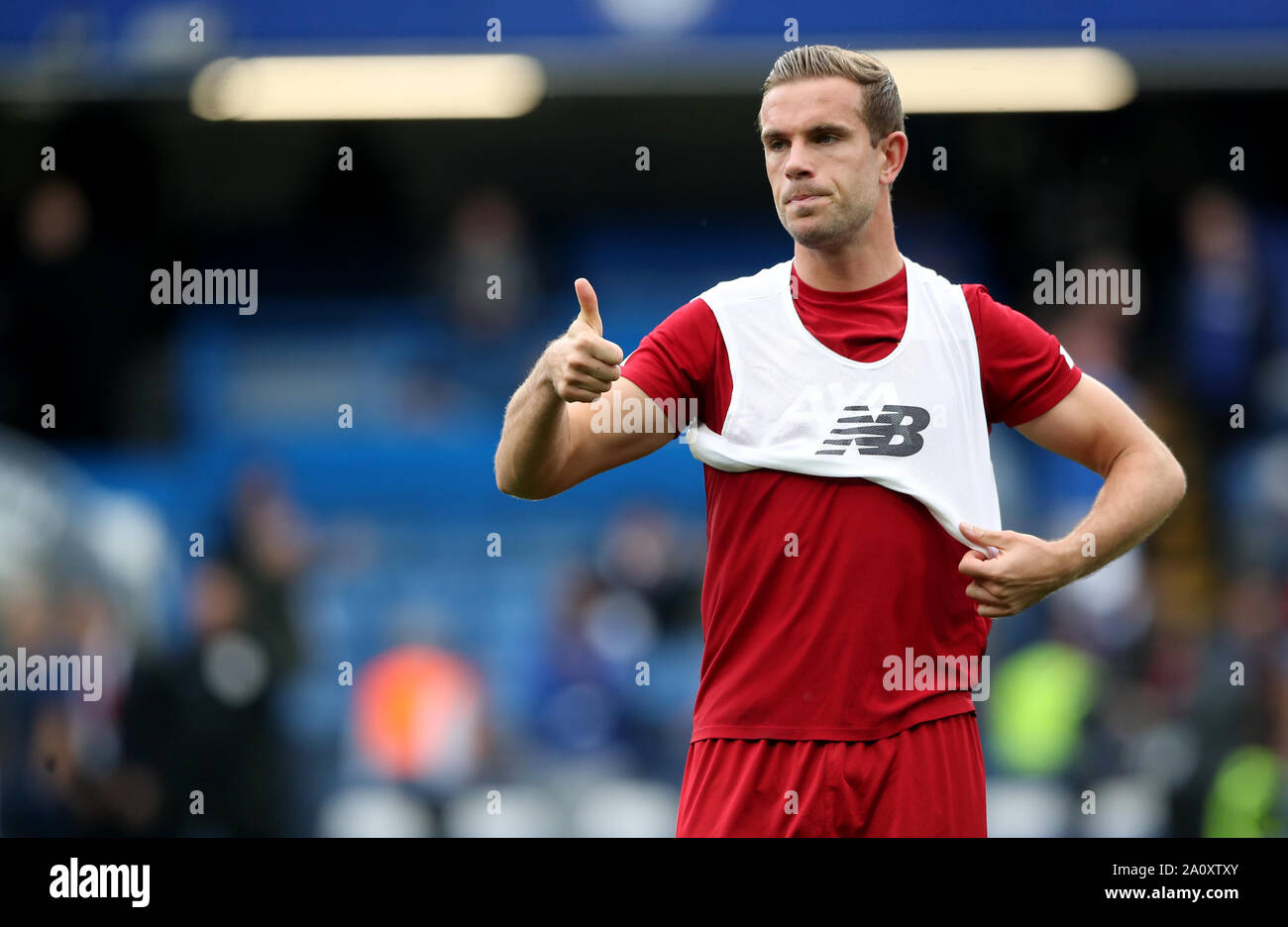 Liverpool's Jordan Henderson during warm-up before the Premier League match at Stamford Bridge, London. Stock Photo