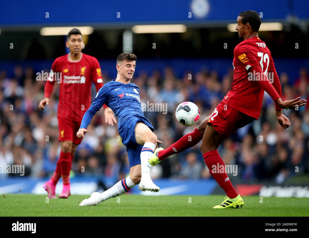 Chelsea's Mason Mount (left) and Liverpool's Joel Matip (right) battle for the ball during the Premier League match at Stamford Bridge, London. Stock Photo