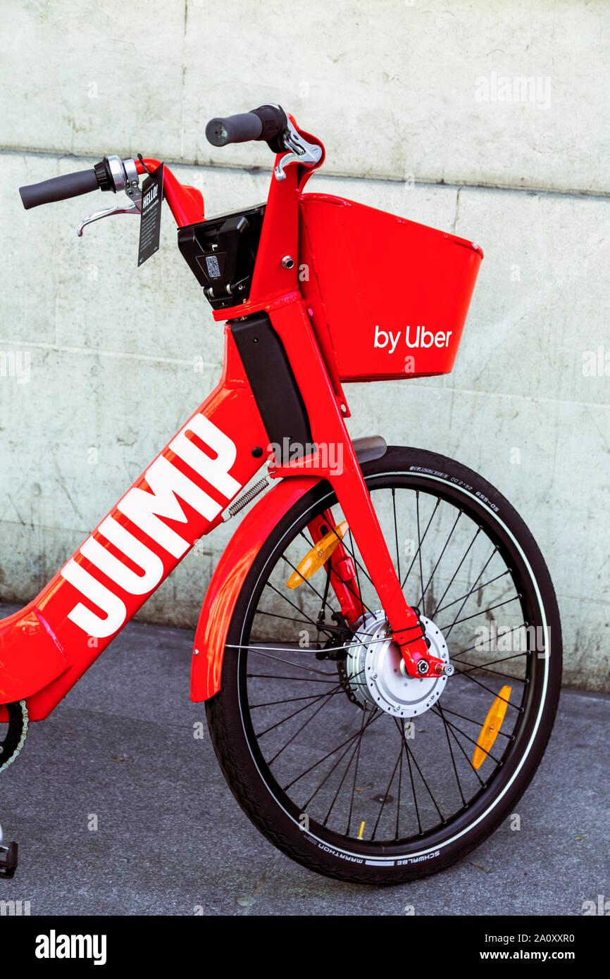 Dockless electric bicycle parked on the pavement from Jump bicycle sharing scheme, London, UK Stock Photo