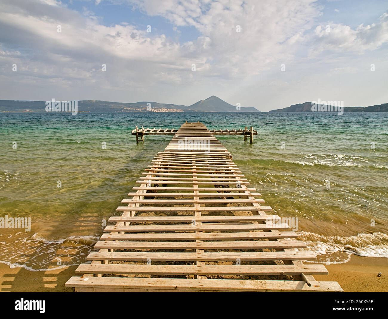 Rough wooden pier, over sea water, Gialova lagoon, Peloponnese, Greece. Stock Photo