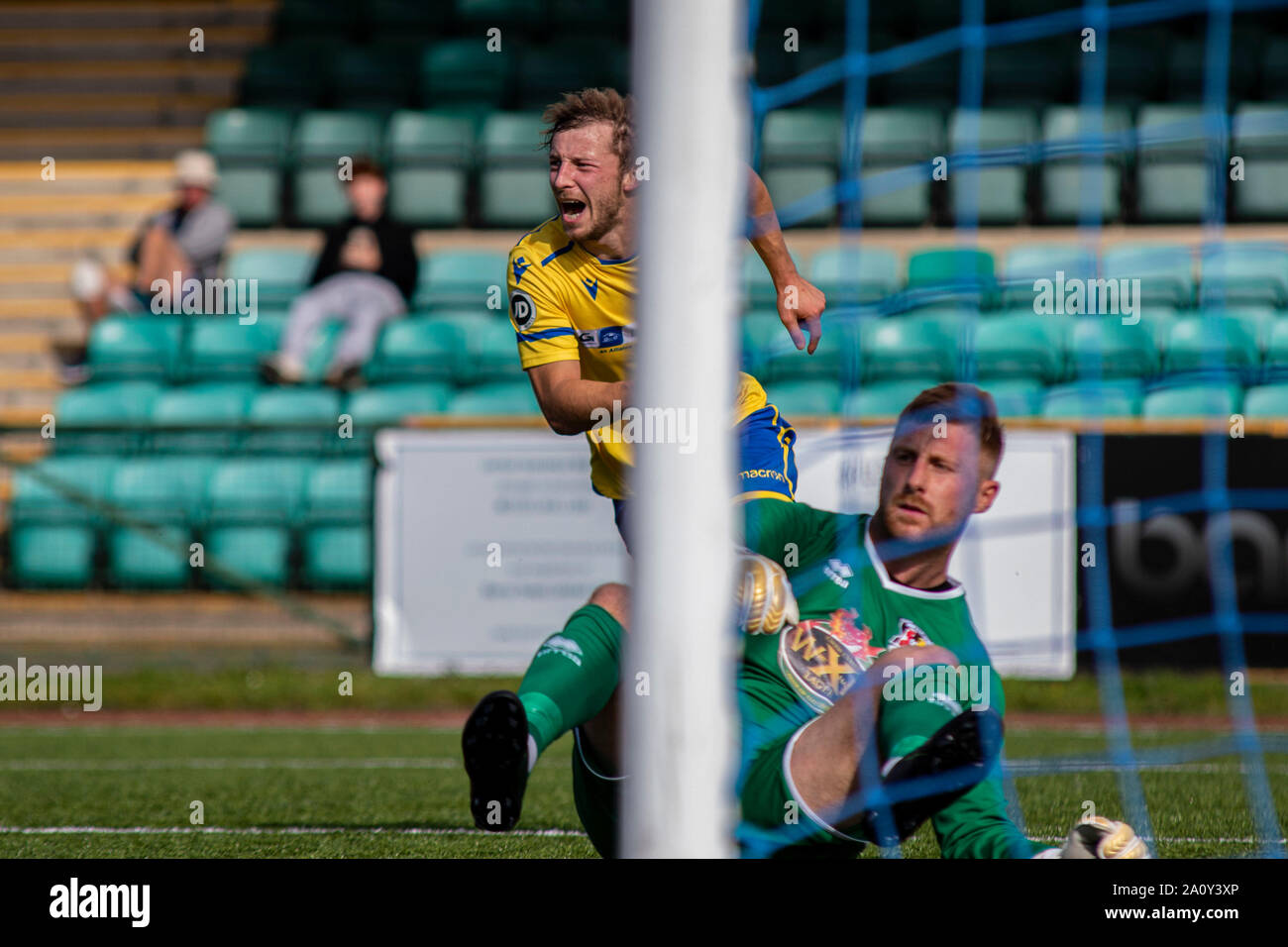 Chris Hugh of Barry Town scores his sides opening goal against Cefn