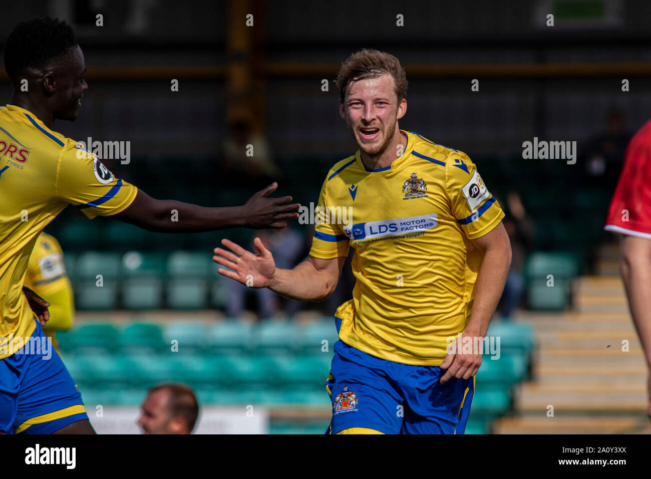 Chris Hugh of Barry Town scores his sides opening goal against Cefn