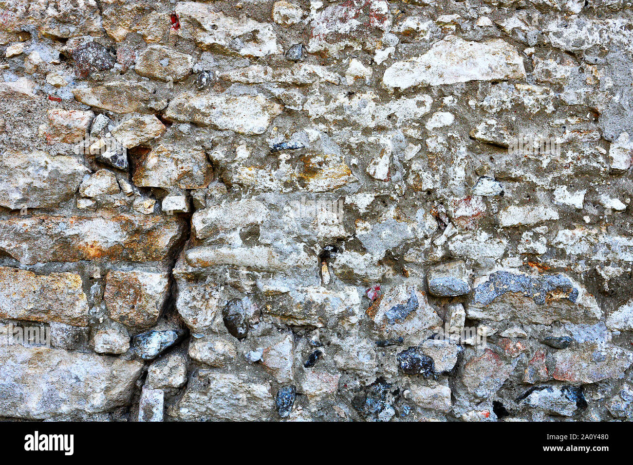 cracked surface of old stone wall, texture for your design Stock Photo