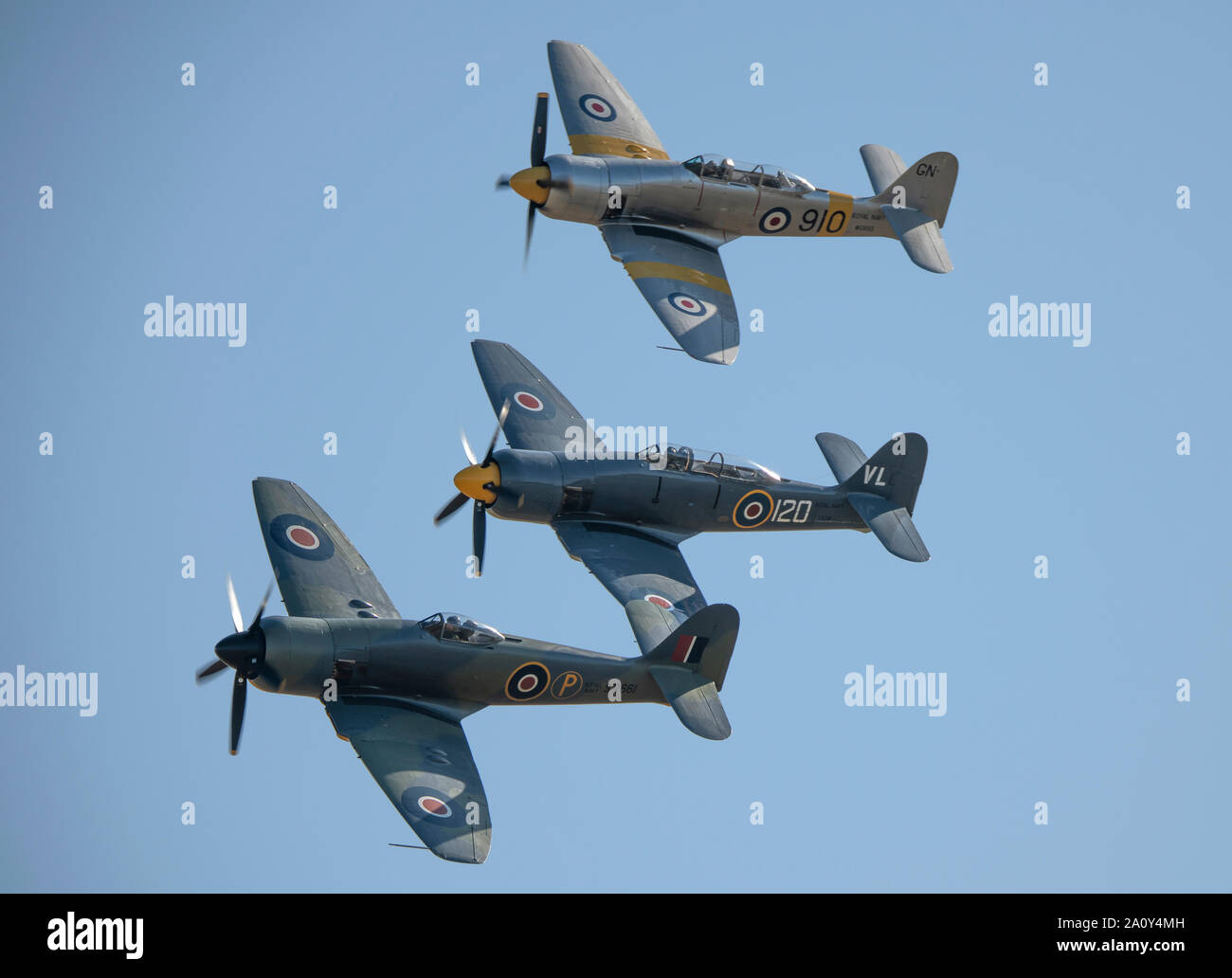 Formation flight of three Hawker Fury warplanes displaying at IWM Duxford 2019 Battle of Britain air show, Cambridgeshire, England, UK Stock Photo