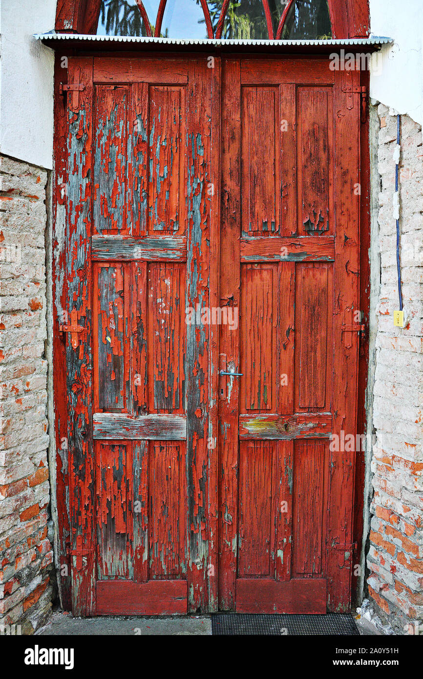 old damaged wooden door, architectural background for your design Stock Photo