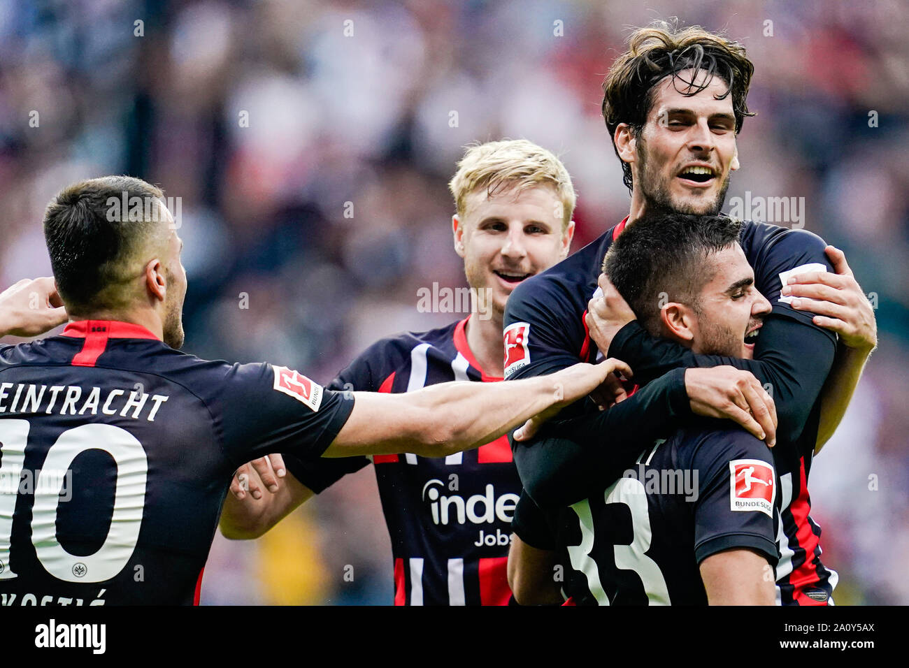 22 September 2019, Hessen, Frankfurt/Main: Soccer: Bundesliga, Eintracht Frankfurt - Borussia Dortmund, 5th matchday, in the Commerzbank Arena. Frankfurt goal scorer Andre Silva (r) cheers with his team-mates, Filip Kostic, Martin Hinteregger and  Goncalo Paciencia over the gate to 1-1. Photo: Uwe Anspach/dpa - IMPORTANT NOTE: In accordance with the requirements of the DFL Deutsche Fußball Liga or the DFB Deutscher Fußball-Bund, it is prohibited to use or have used photographs taken in the stadium and/or the match in the form of sequence images and/or video-like photo sequences. Stock Photo