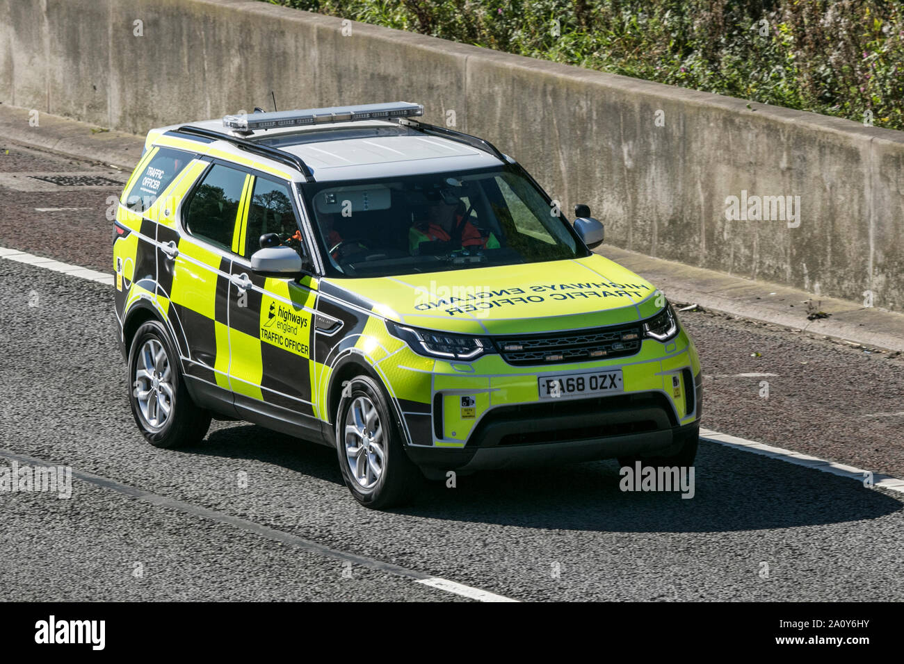 A Highways Agency range rover travelling northbound on the M6 motorway near Garstang in Lancashire, UK. Stock Photo