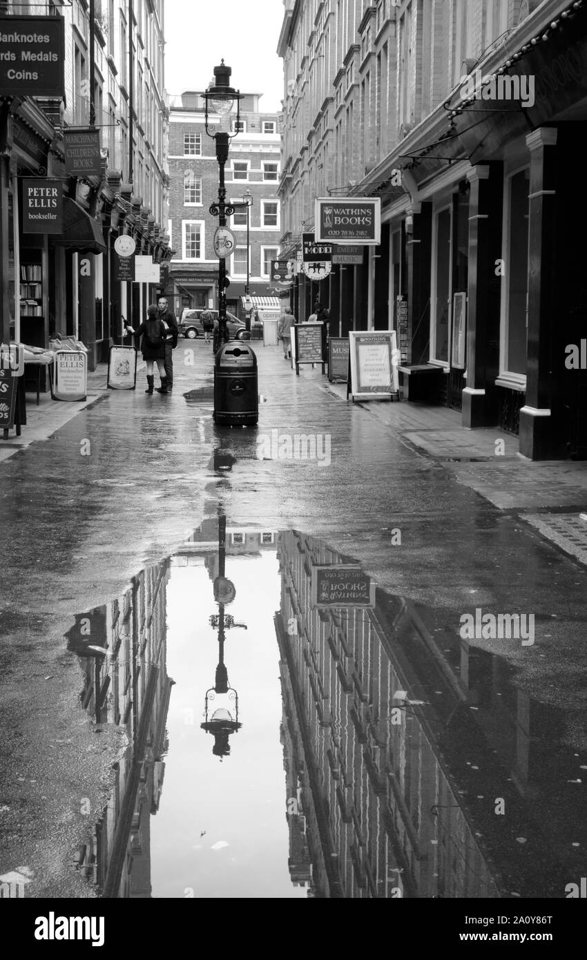 Reflection of a lamppost in Cecil Court, London Stock Photo