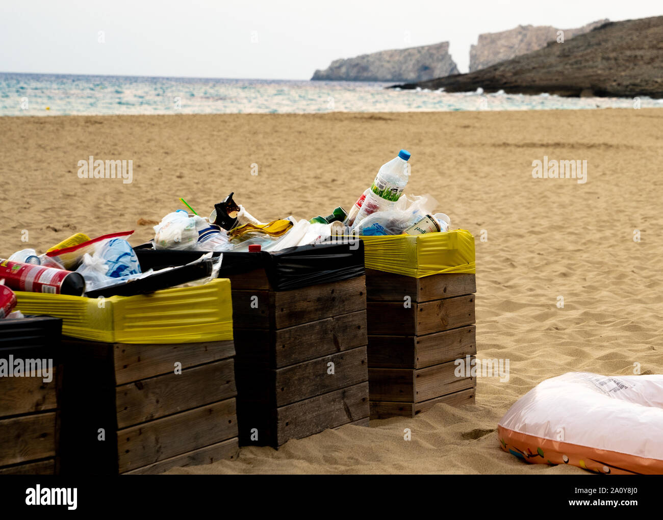 Full trash cans at beach Stock Photo Alamy