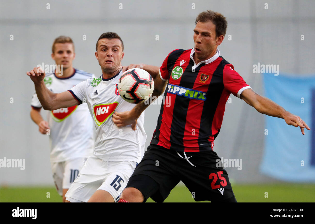 BUDAPEST, HUNGARY - JUNE 27: (l-r) Tokmac Chol Nguen of Ferencvarosi TC  fights for the ball with Dániel Farkas of Mezokovesd Zsory FC during the  Hungarian OTP Bank Liga match between Ferencvarosi TC and Mezokovesd Zsory  FC at Groupama