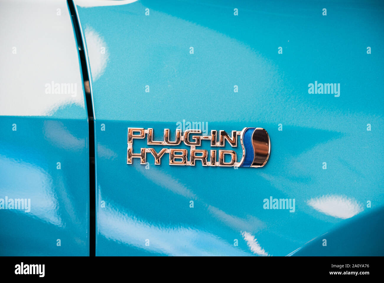 Toyota plug-in hybrid sign seen on a Toyota Levin vehicle displayed at an electric and hybrid cars retailer in Shanghai. Stock Photo