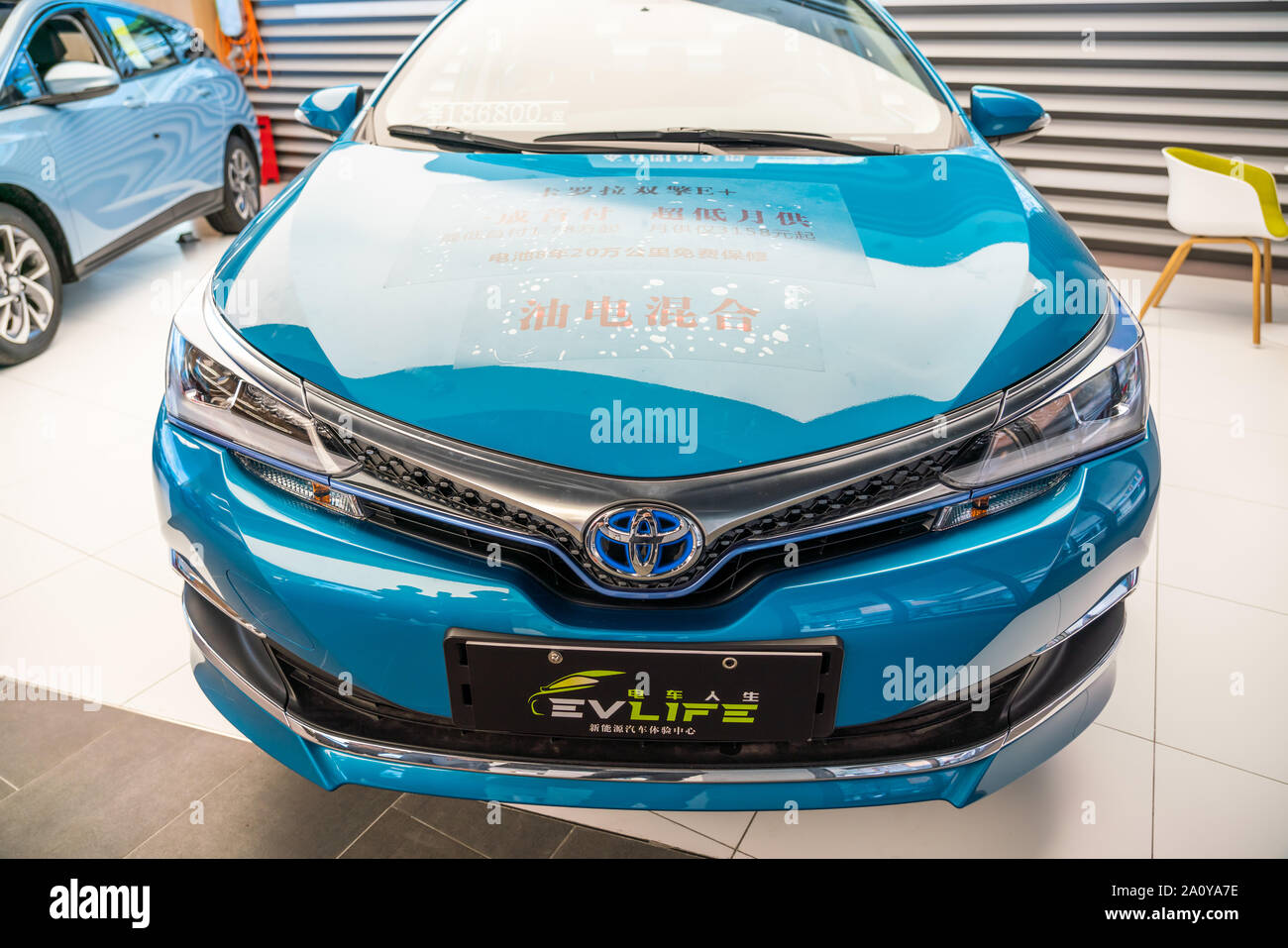 Toyota Levin plug-in hybrid electric vehicle displayed at an electric and hybrid cars retailer in Shanghai. Stock Photo